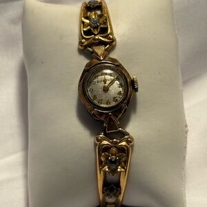Bulova Gold and Silver Women's Watch with Floral Accents